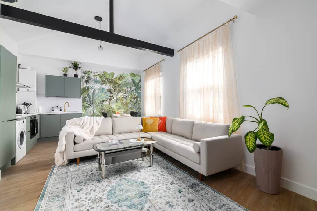High ceiling, airy space, large soundproof modern windows with built in ventilation, air conditioning 