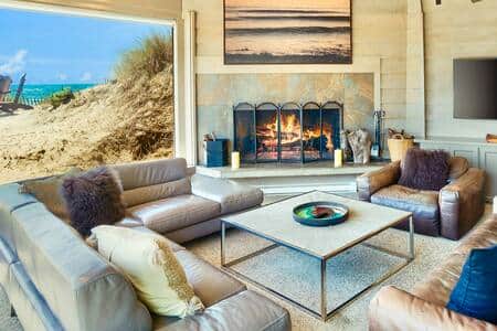 Oceanfront and crashing wave views Great room with 65" TV lots of comfortable seating leather sofas Oceanfront and crashing wave views Great room with 65" TV lots of comfortable seating leather sofas