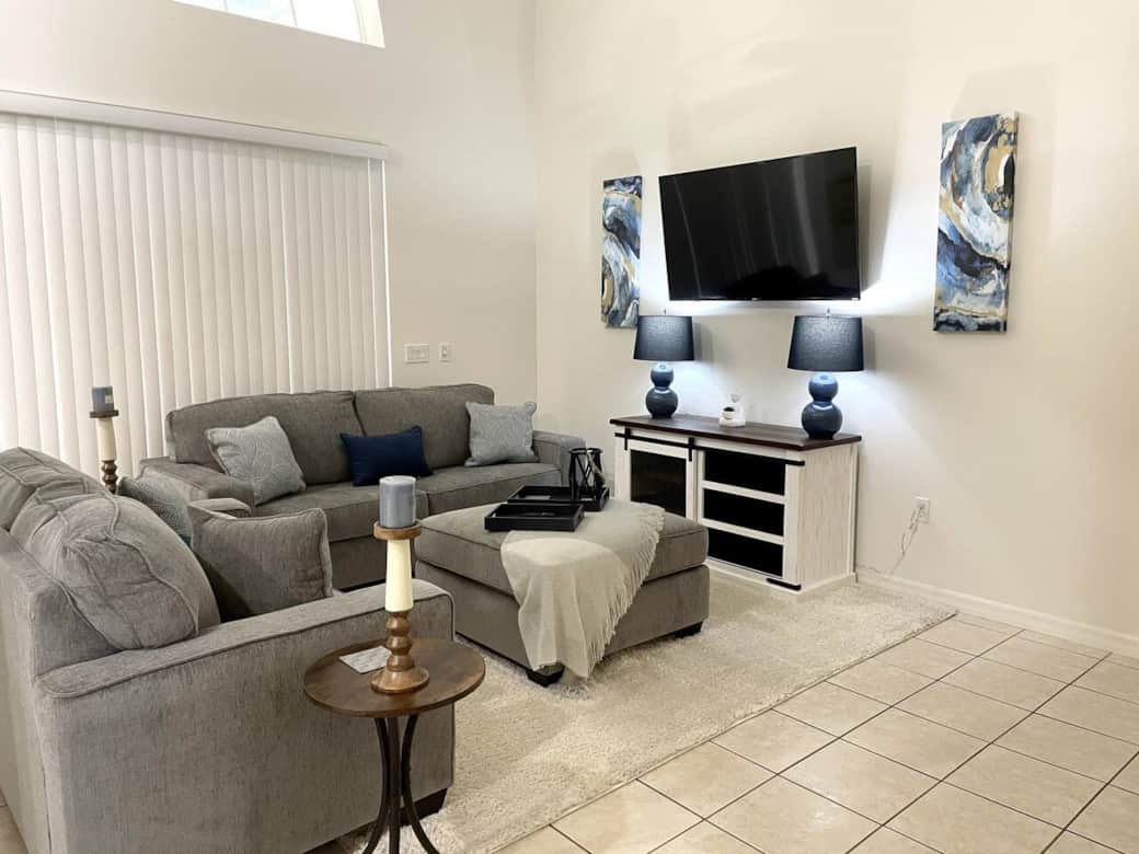 Living room with smart tv and access to the private pool