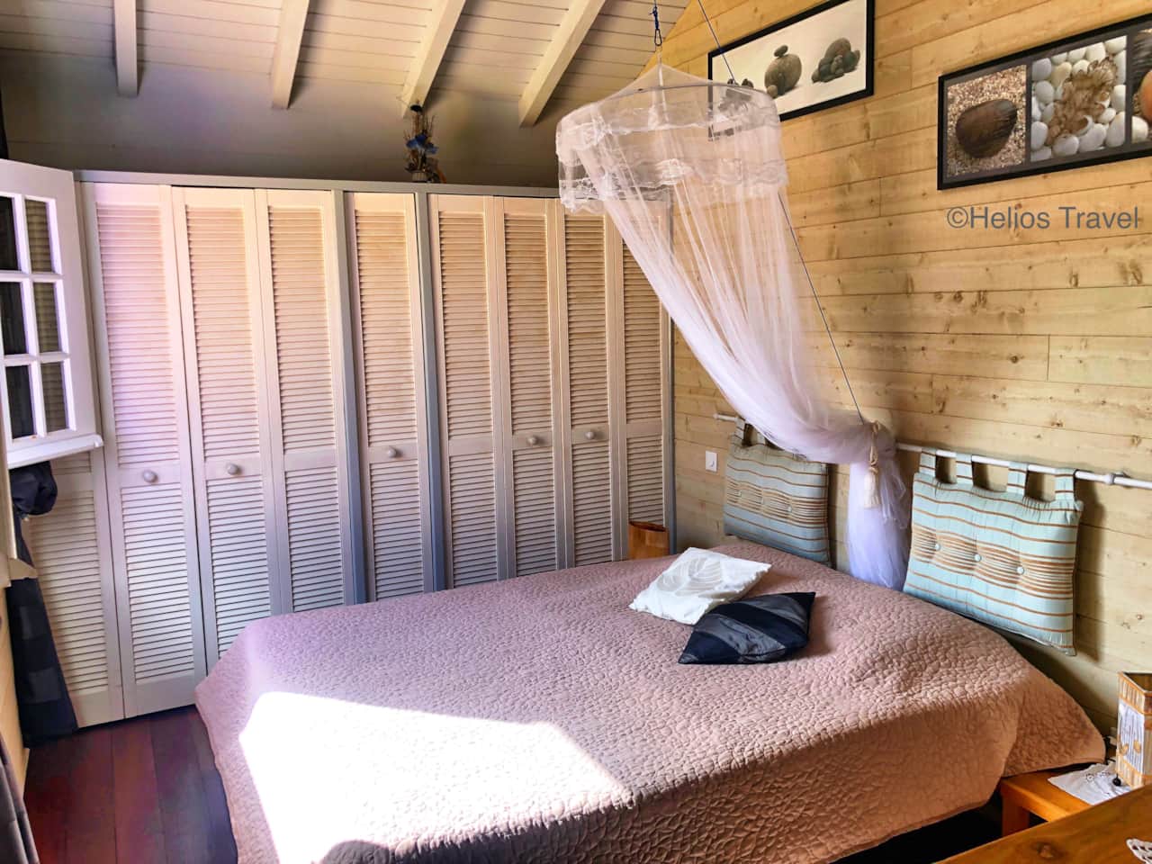 Room 1 is air-conditioned and features a 160cm bed and a mosquito net.