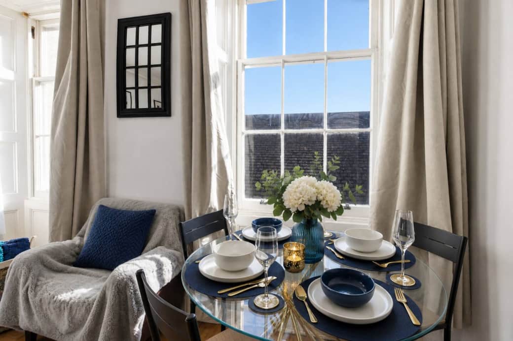 Intimate dining area perfect for meals or working remotely