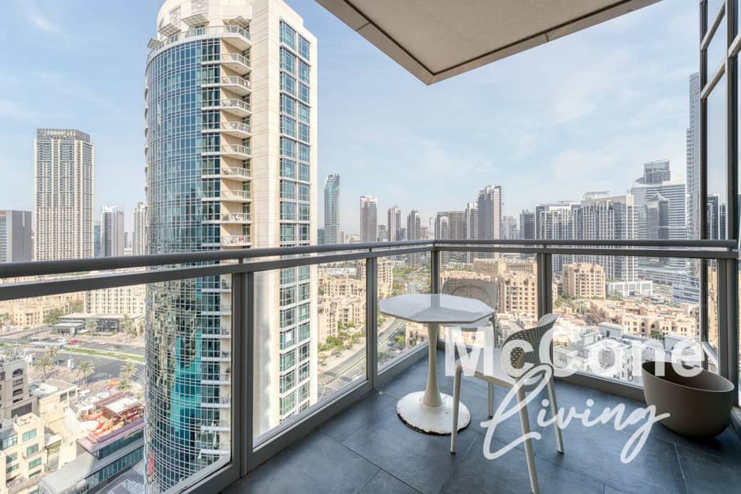 Private balcony with breathtaking views of the Dubai skyline perfect for sunrise coffee or evening relaxation in the heart of the city.