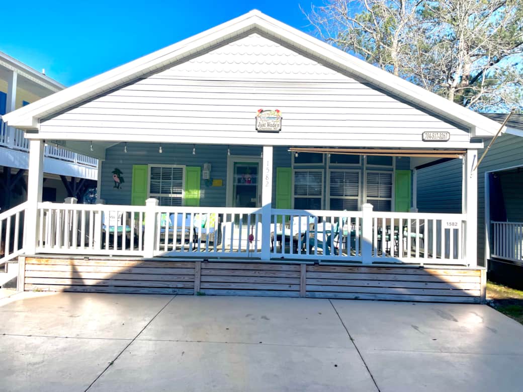 Large covered front porch with parking