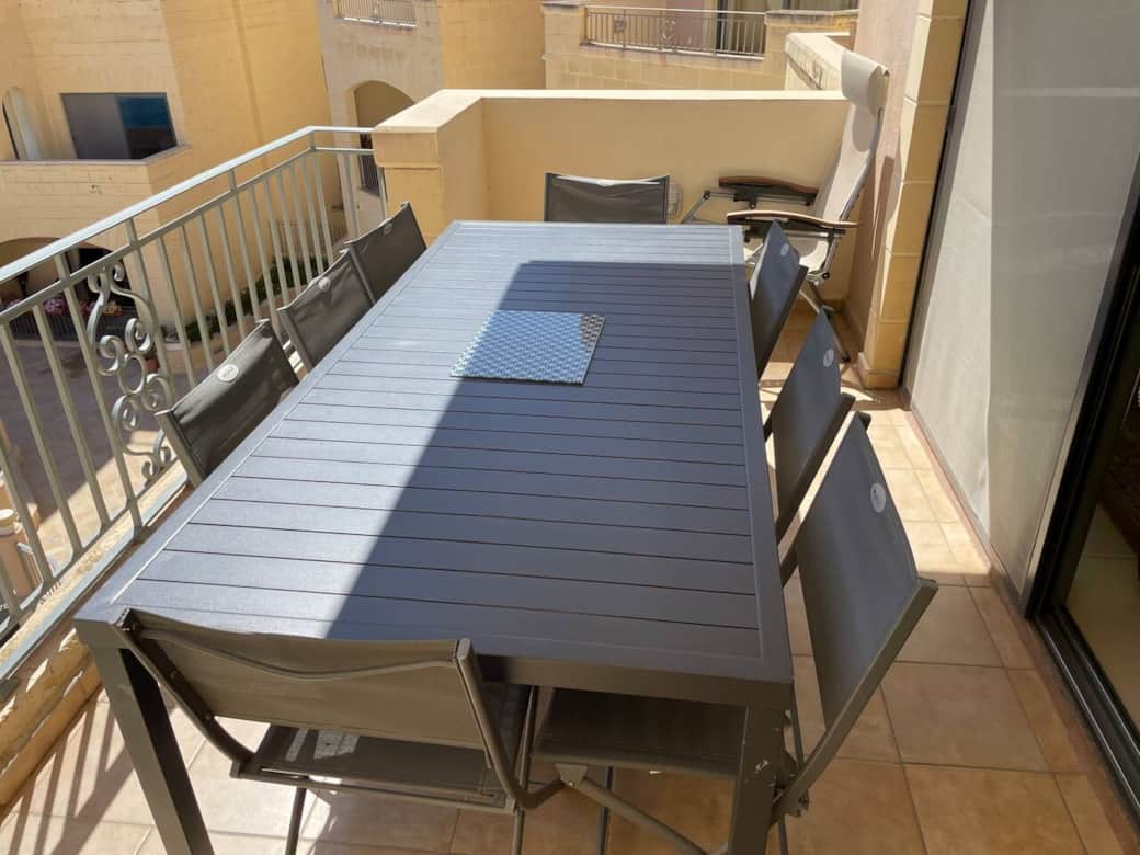 Front Terrace table overlookin the pool