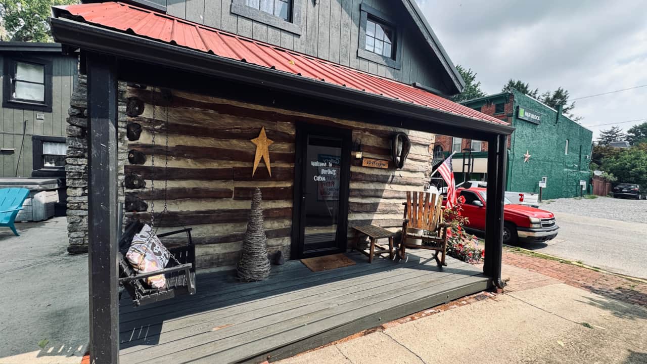 Covered porch at a historic Augusta, Kentucky cabin