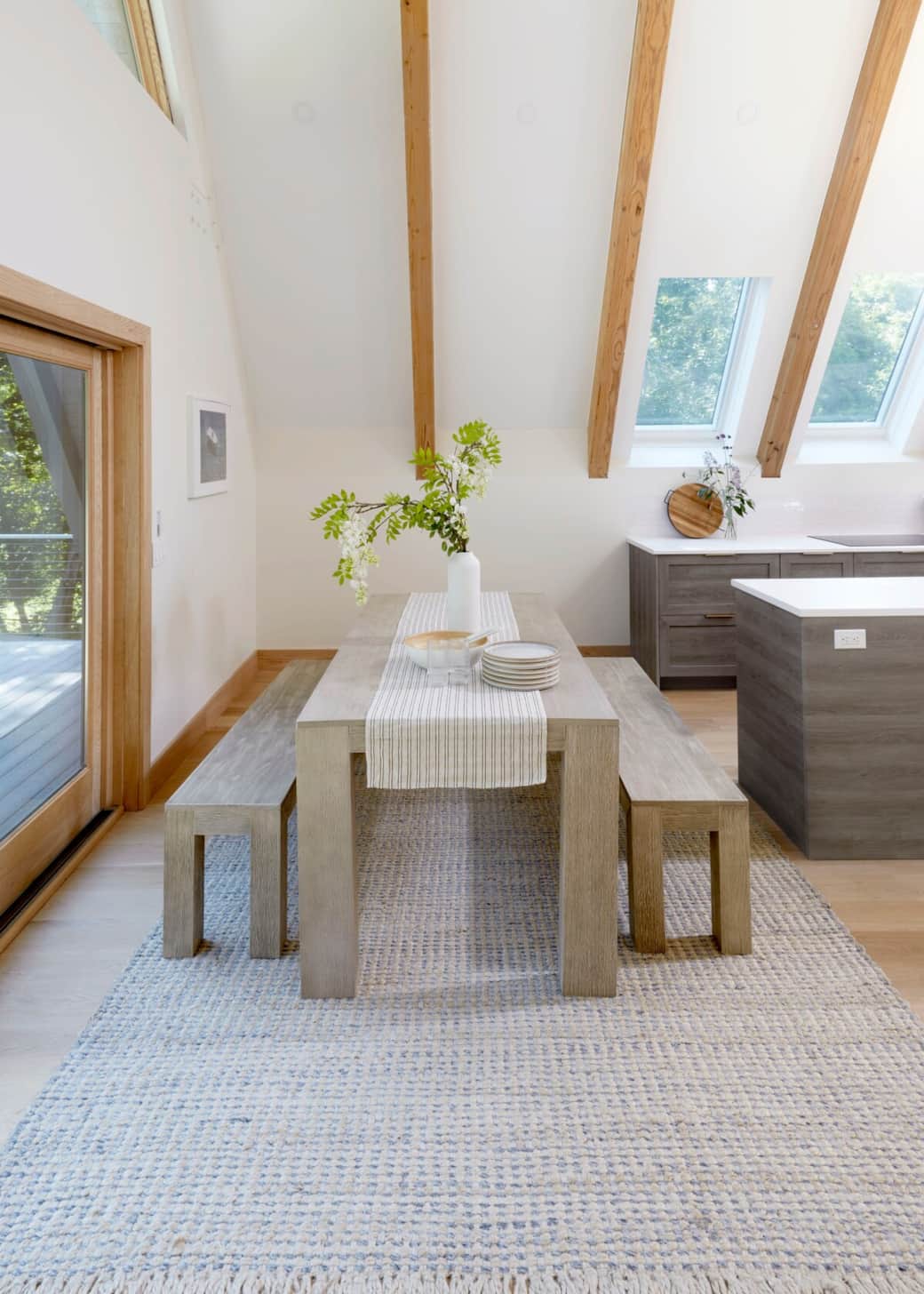 White oak finishes and curated simplicity for the modern host.