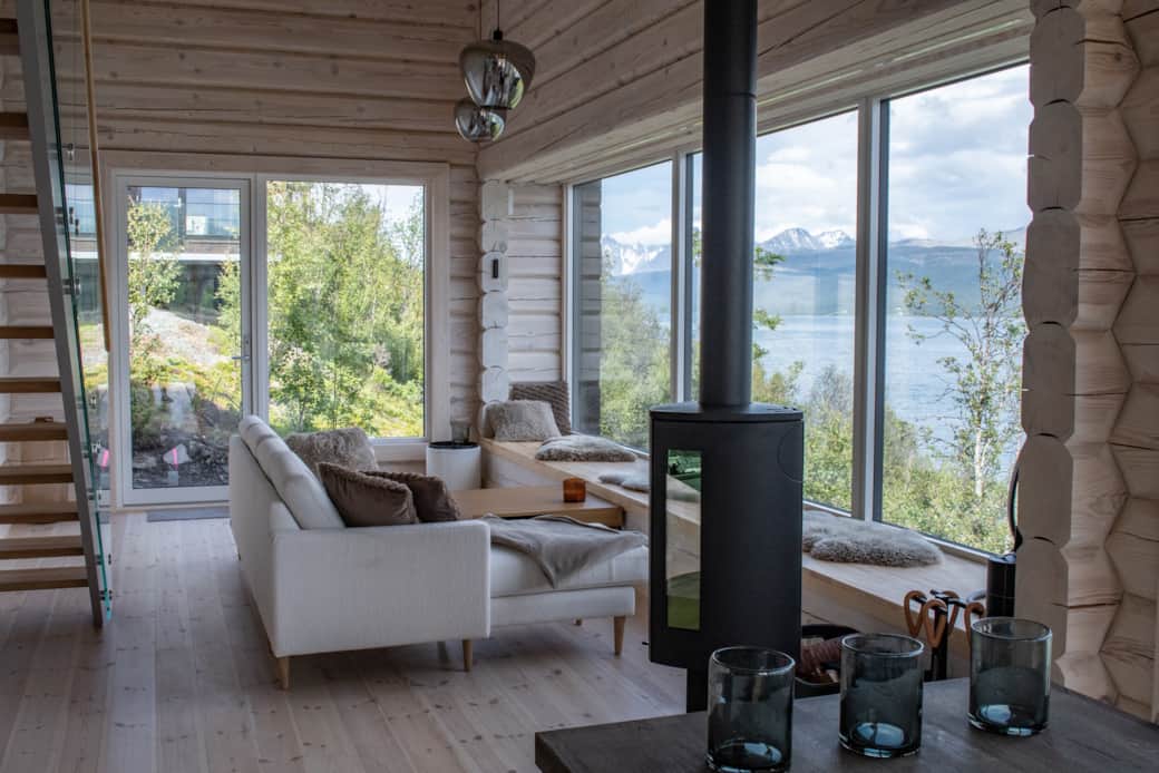 One fire, one sofa, one fjord. Reserve your nights at Bjørka.