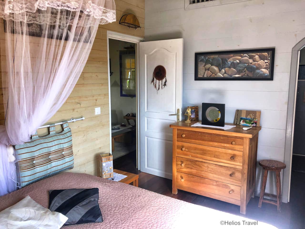 Room 1 is air-conditioned and features a 160cm bed and a mosquito net.