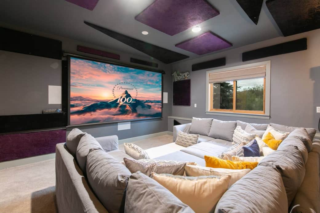 Movie theater room. Hang out with everyone and enjoy a movie or watch your favorite team on this 120” screen with an incredible sound system. Can serve as an additional bedroom (sofa is larger than a king bed and very comfortable).