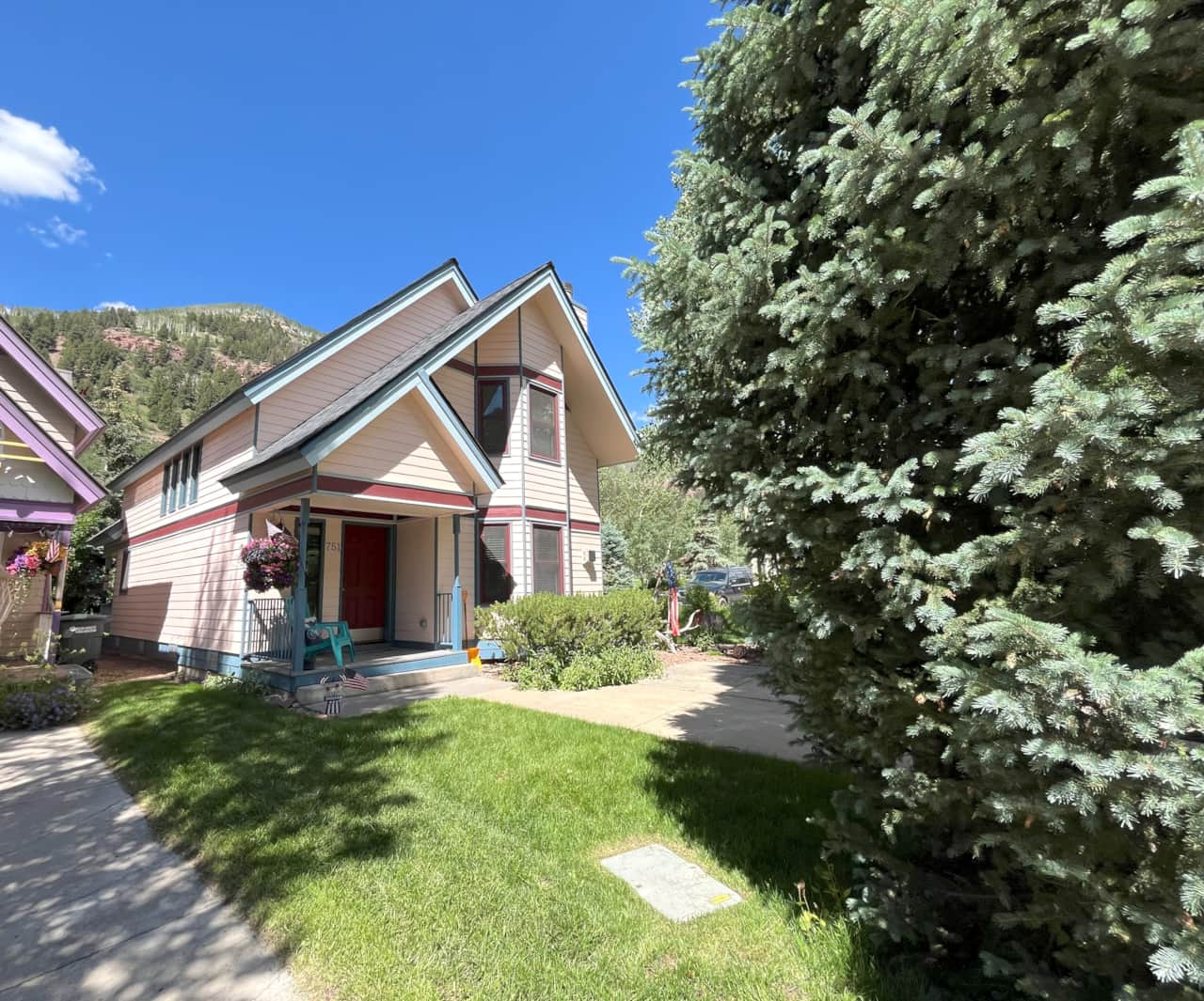 Summer exterior of Bachman Village 9 - private home with backyard - a rare Telluride find!