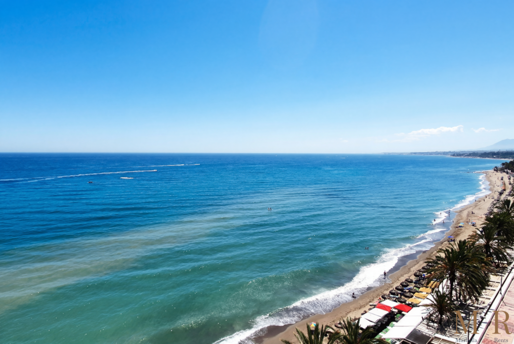 Overlooking beach and promenade.