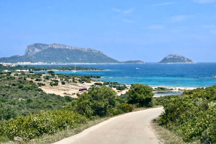 Crystal-clear shallow water at Pittulongu beach near Olbia
