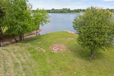 Community fire pit located outside of private pool gates
