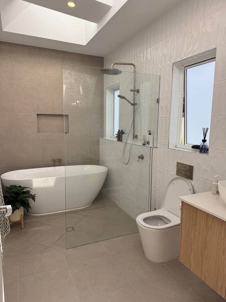 Master ensuite attached to master bedroom w/large bath, walk in shower w/rain head & handheld. 