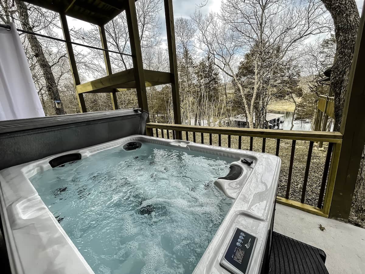 Outdoor hot tub looking at lake 