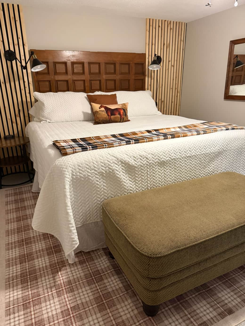 Ralph Lauren would love this cozy king lower-level bedroom