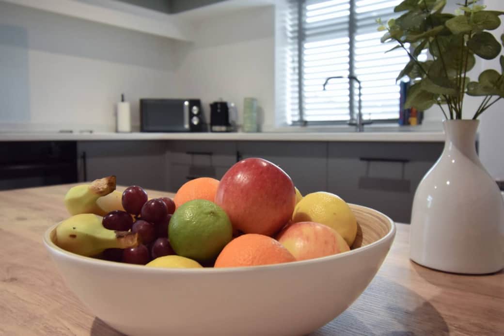 A bright, modern kitchen space with everything you need to prepare meals and enjoy time together.