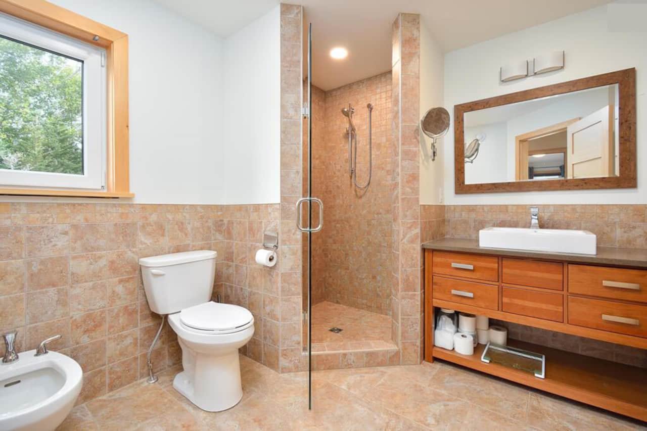 Master suite with walk-in closet, vanity, bidet, soaking tub and walk-in shower (on main floor)