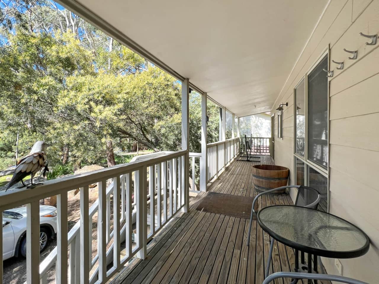 Experience the charm of our front veranda boasting an amazing view. 