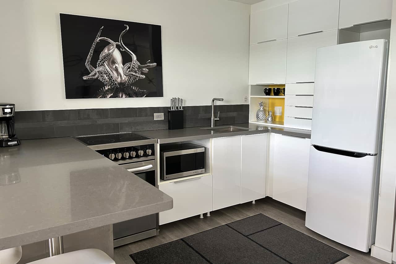 Unit #15 Kitchen is equipped with everything you need to complete a full meal.