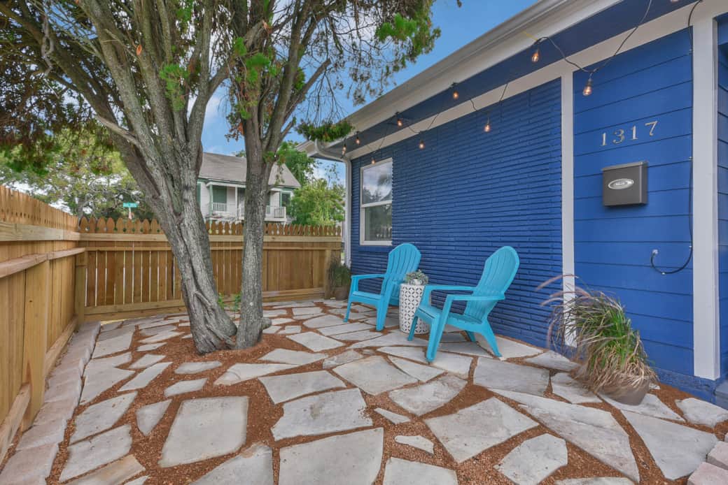 The front porch patio has seating for morning coffees, as well as a BBQ grill, and beach toys. The front porch patio has seating for morning coffees, as well as a BBQ grill, and beach toys.