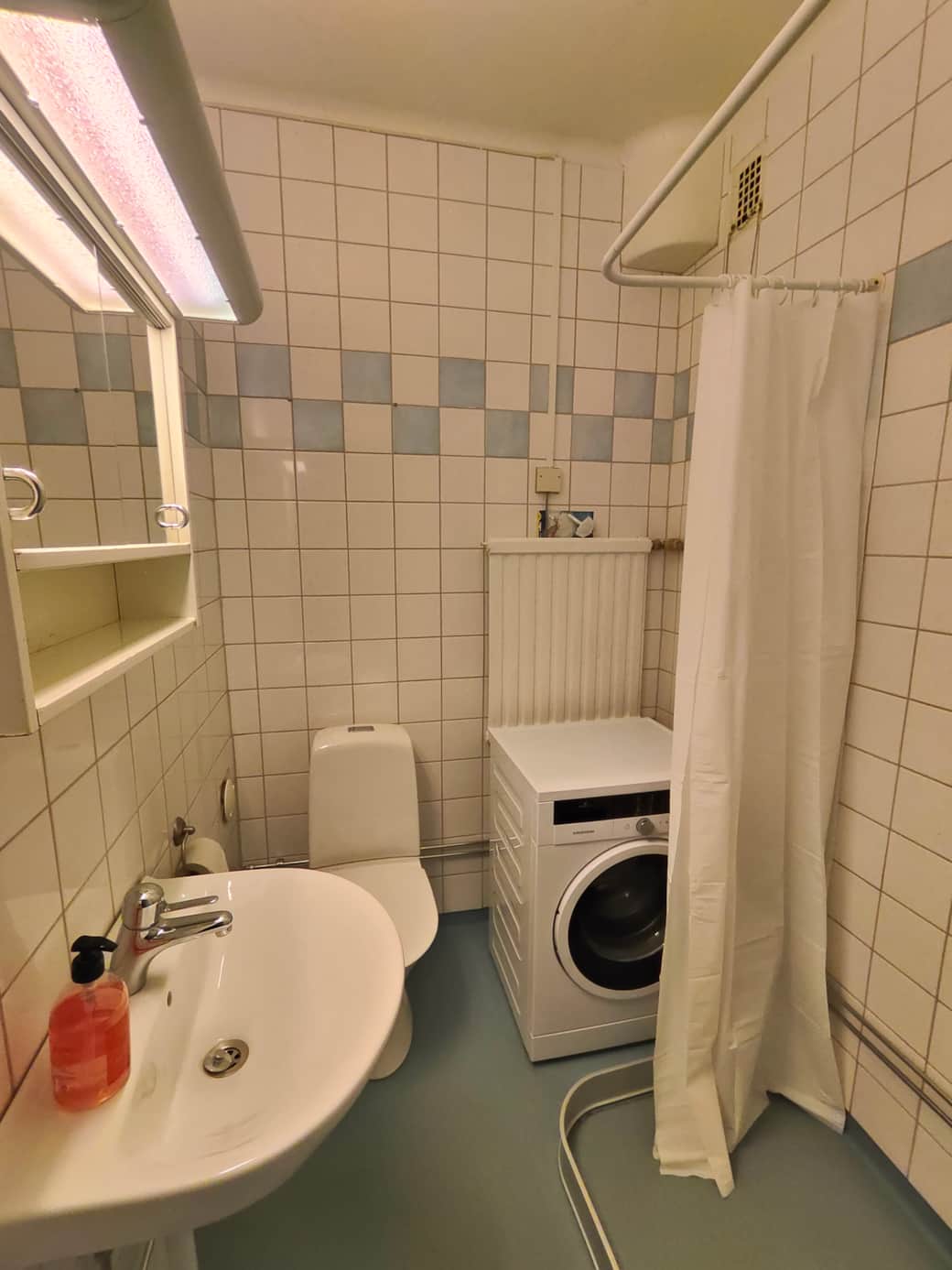 Bathroom with washing machine