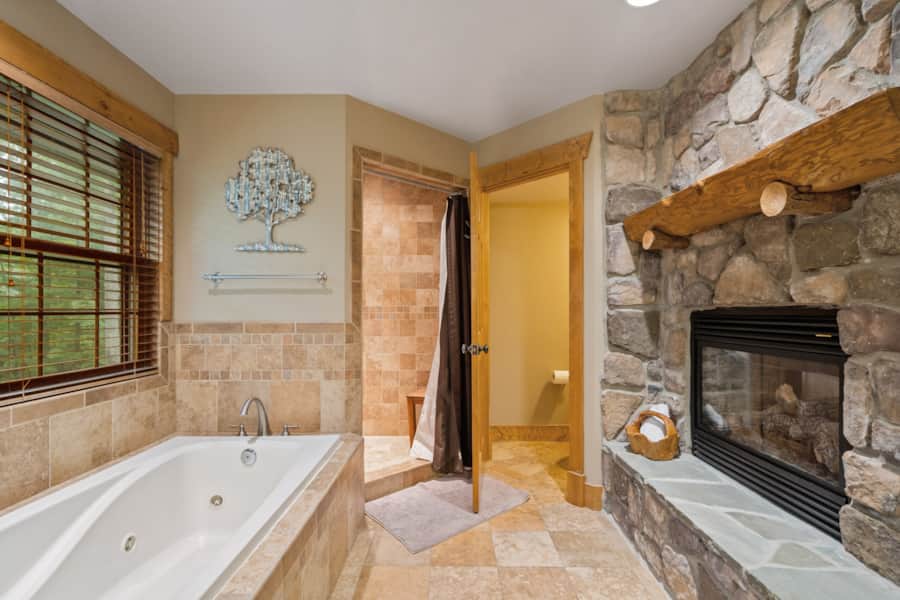 Owner's bath with fireplace