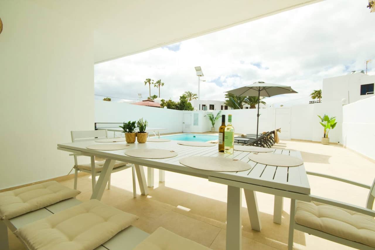 Heated private pool and outdoor terrace at Villa Lux by AZ Rentals