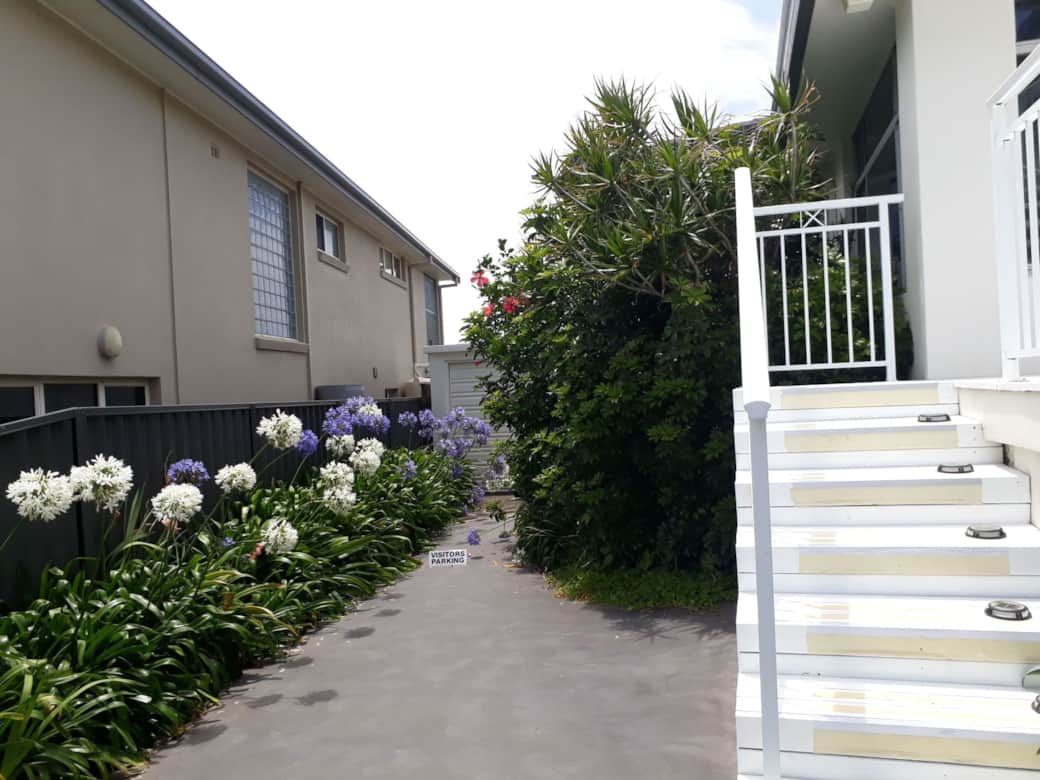 Enjoy ultimate peace of mind with dedicated private guest parking and a level entrance pathway.