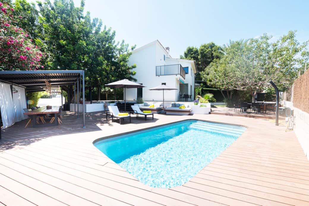Outdoor lounge and garden terrace at Casa Guindilla private villa in Portals Nous, Mallorca