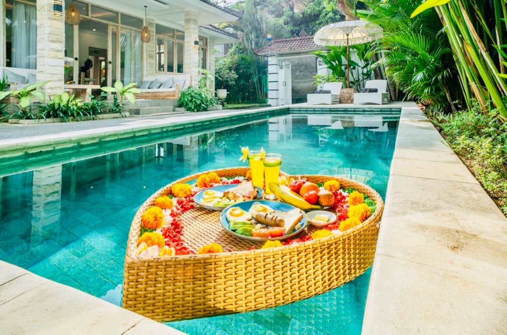 Signature floating breakfast served in your private pool – the ultimate Bali experience