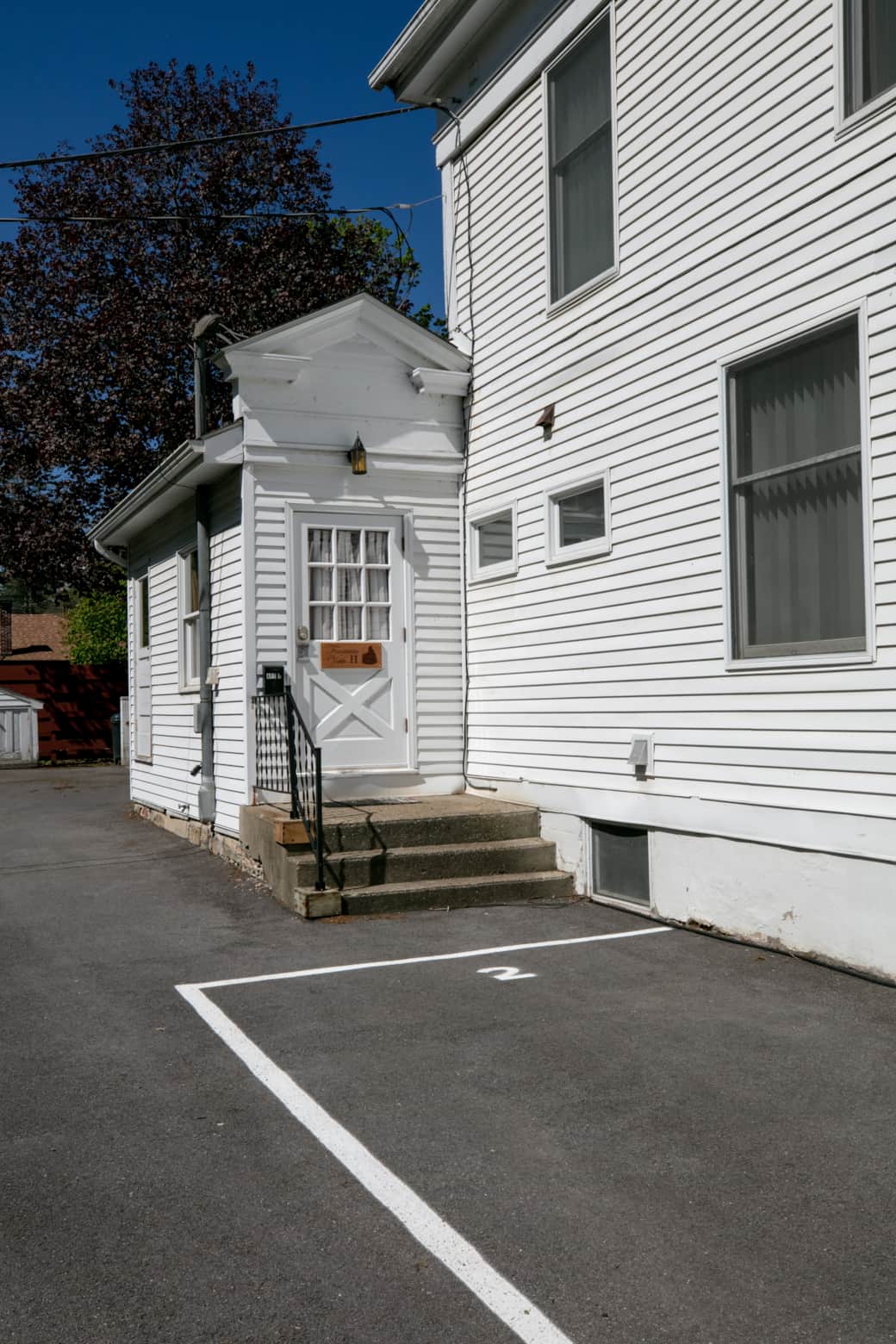 Private entrance and designated parking spot for Fountain View II