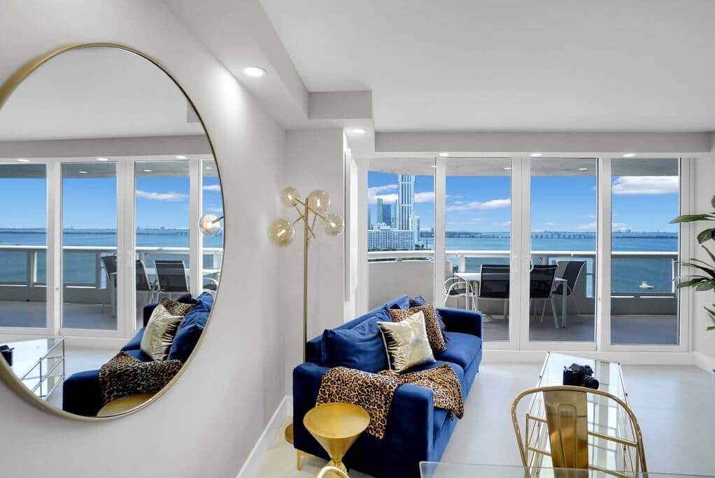 Dining area for 4, living area with Roku streaming tv, balcony access, water views of Biscayne Bay