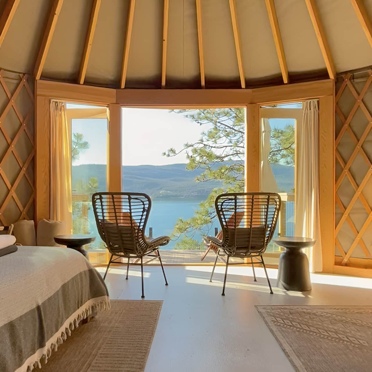 Large double doors and a frameless glass guard bring the view inside.
