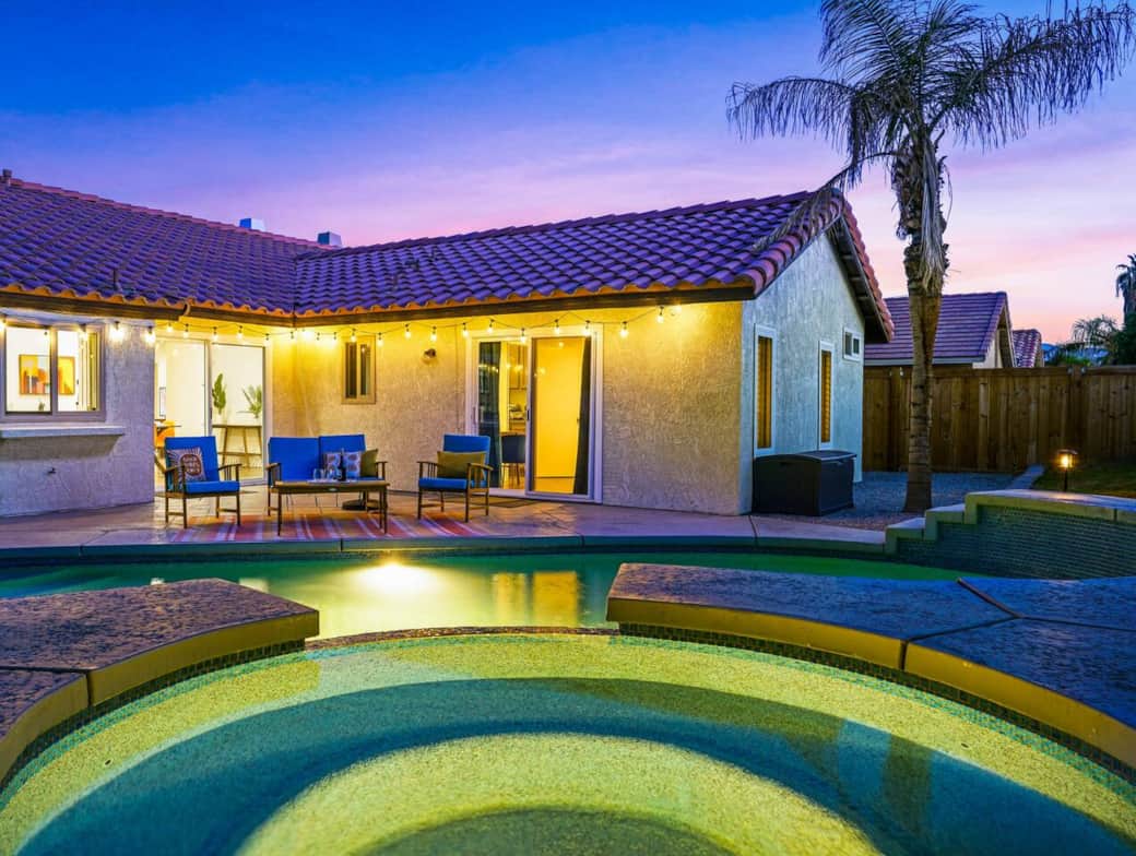Spend evenings relaxing on our lovely pool patio. Our amazing pool can be heated (for an extra fee of $75/day) so you can swim all year. The hot tub heat is free of charge.

Sliding doors to pool area have child safety features to keep kids safe.