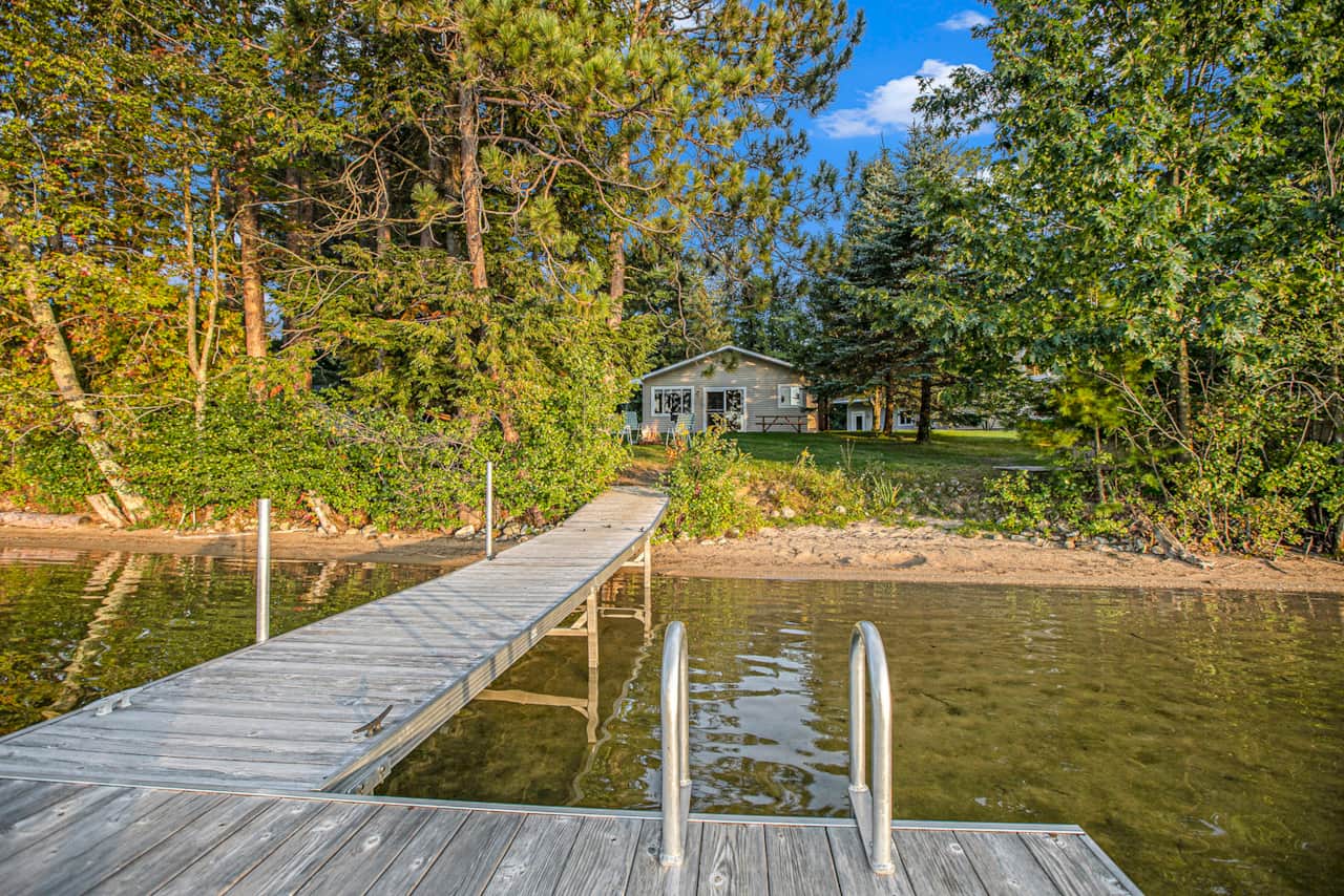 Private sandy beach and dock, just steps from the cabin door