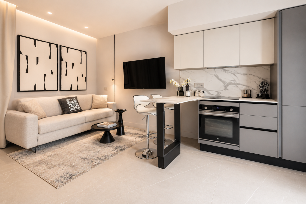 AZULIS delleterme2 livingroom with open kitchen and smart tv