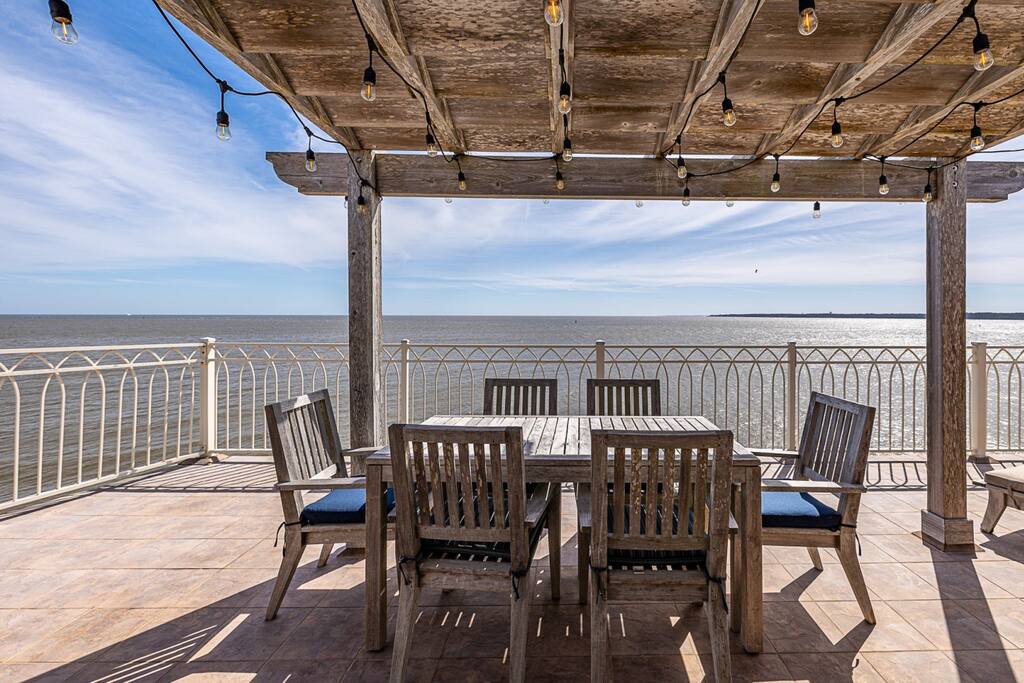 Breathtaking views!  Rooftop entertaining with dining area and lighted pergola.
