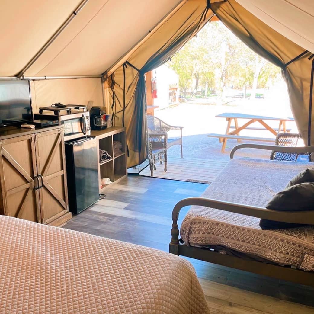Open the tent and enjoy the view from inside the cabin. Open the tent and enjoy the view from inside the cabin.
