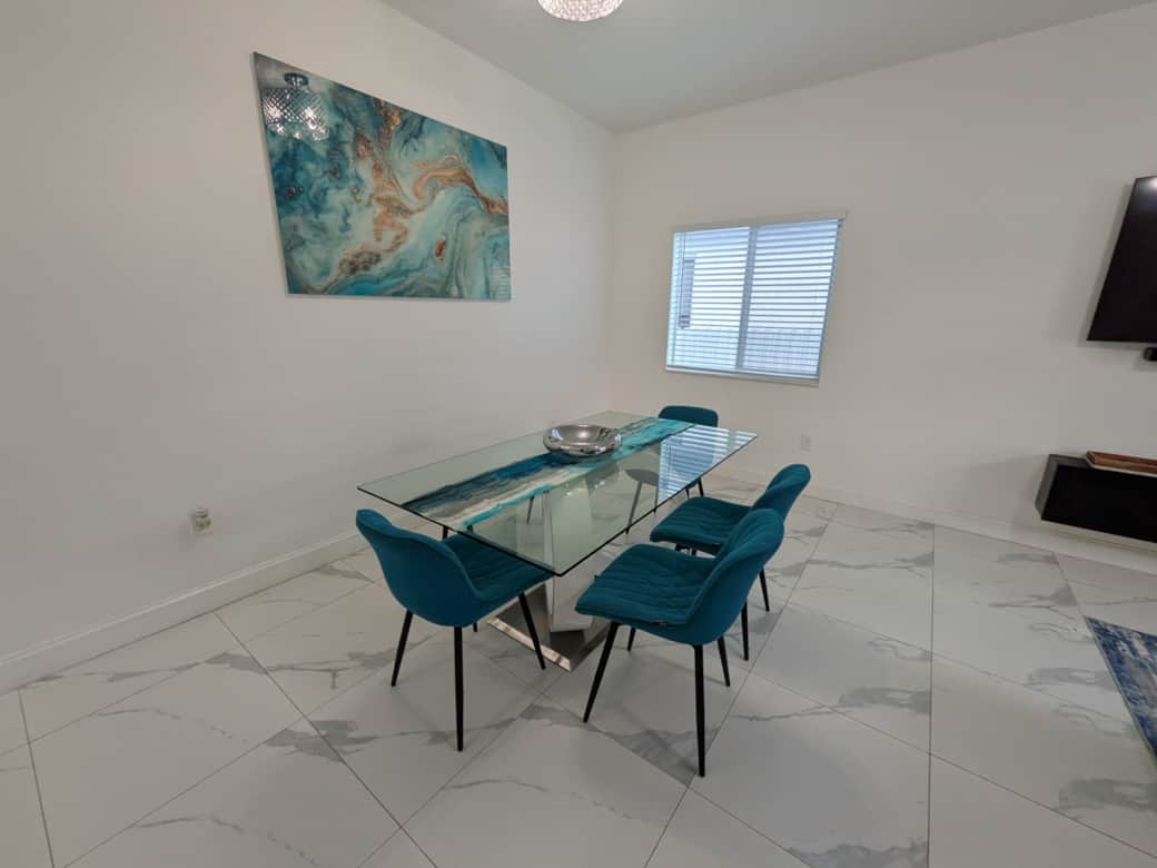 Dining Room – Stylish dining area with seating for 6. Dining Room – Stylish dining area with seating for 6.