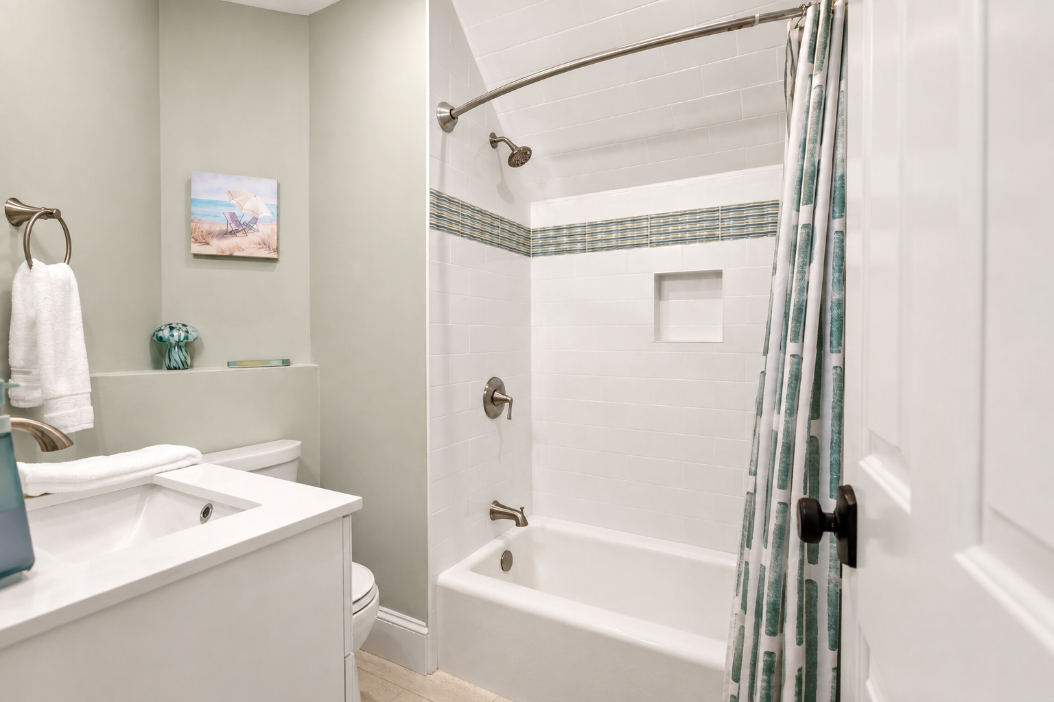 Enjoy a relaxing soak or quick shower, with fresh towels and a convenient vanity close by.