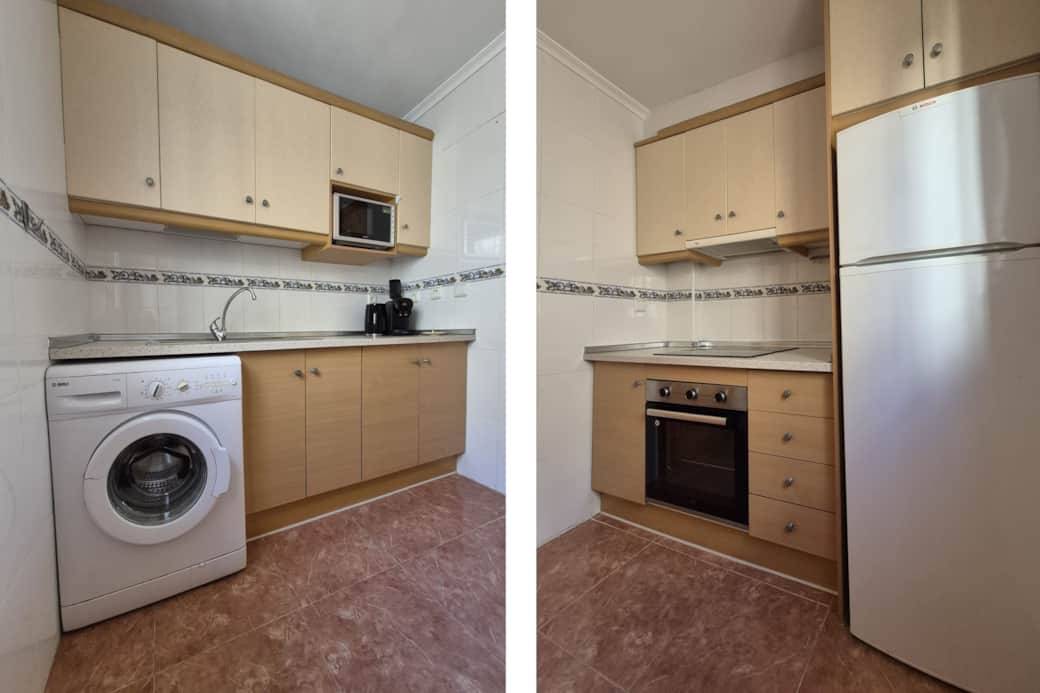 Fully equipped kitchen, complete with a washing machine.
