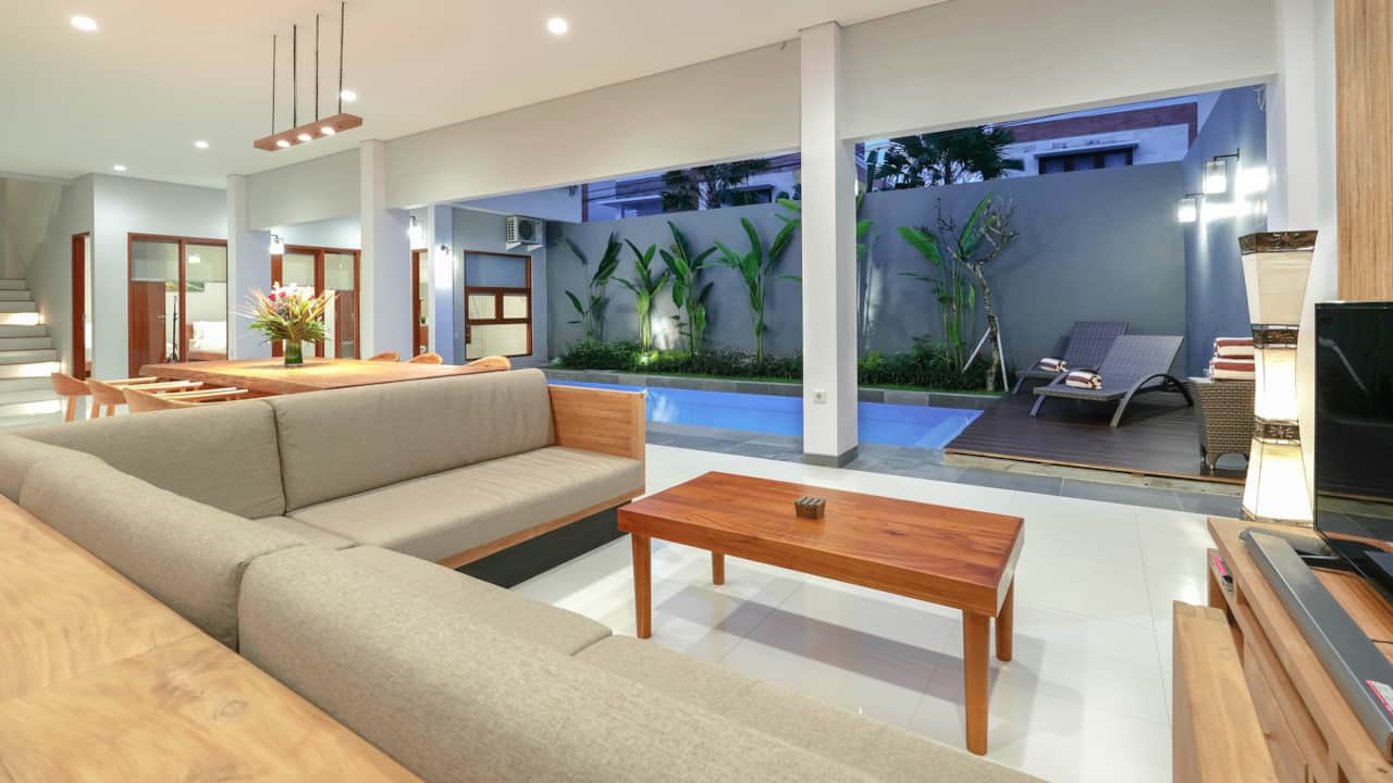 TV lounge area that open onto the outdoor space as a  spot for family entertainment and lounge
