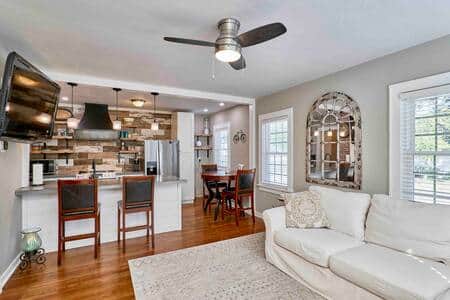 open style living kitchen dining with TV on swivel