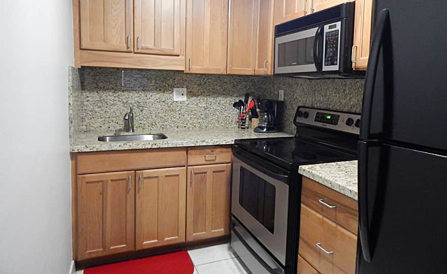 Unit #11 - Full size appliances. Kitchen is stocked with essentials to complete a full meal.