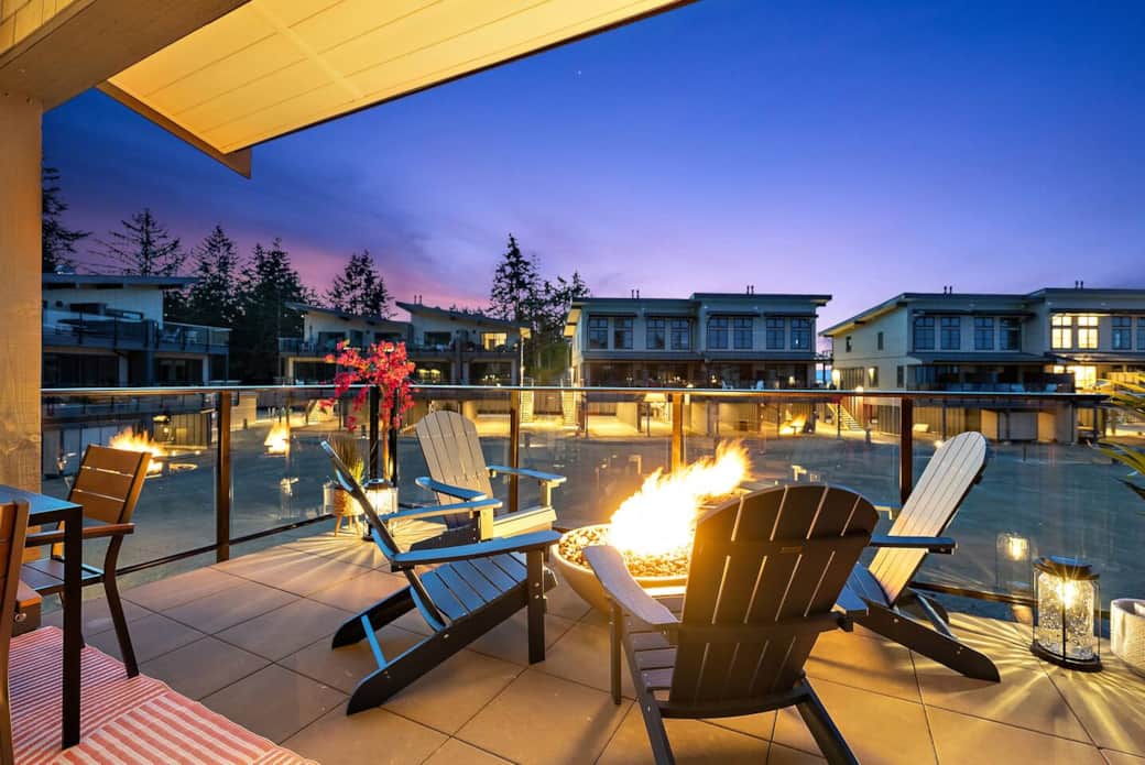 Gas fire bowl with comfortable Adirondack chairs for lounging