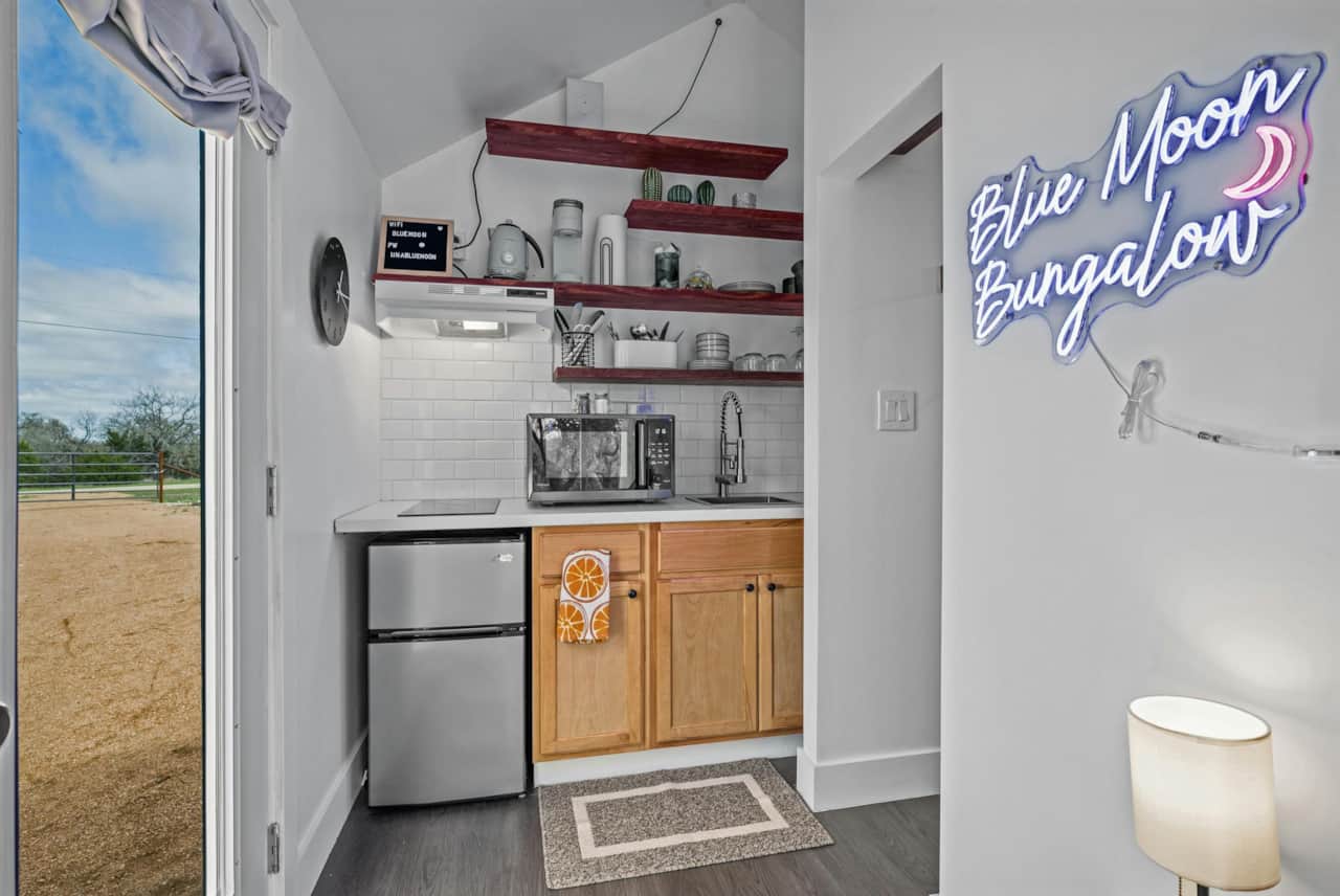 Kitchenette: Whip up delicious meals in this stylish space with a charming view!