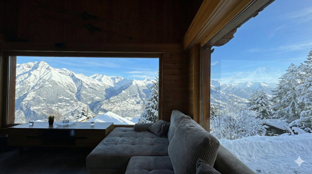 Soak in the panorama from the sofa. Cozy, contemporary alpine living with unmatched views. Soak in the panorama from the sofa. Cozy, contemporary alpine living with unmatched views.