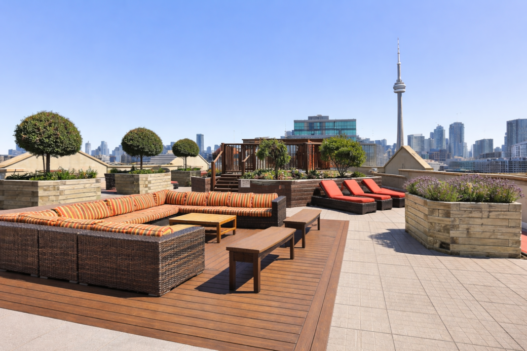 Rooftop terrace with skyline, lake and CN Tower views Rooftop terrace with skyline, lake and CN Tower views
