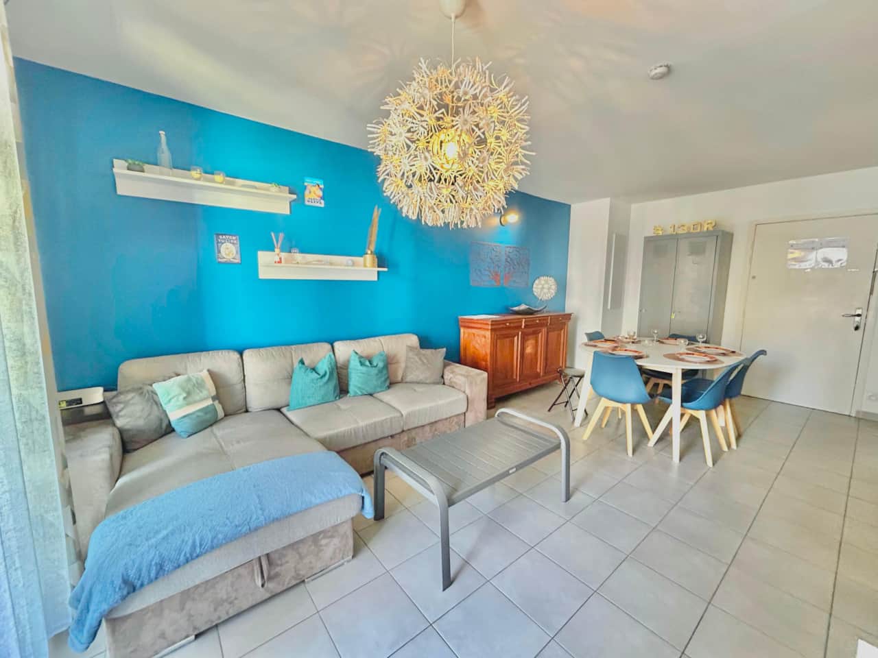 Living room, TV, sofa, coffee table, dining table